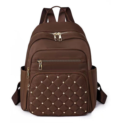 Quilted Rucksack mit dekorativen Nieten Brehn