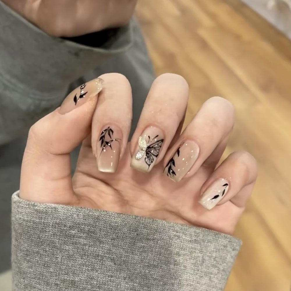 Künstliche Nagelverlängerungen mit floralem Butterfly-Design Brehn