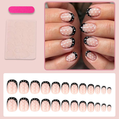 Kunstnagelset mit eleganten Punkten und stilvollem Schwarz Brehn