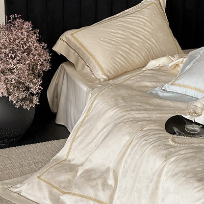 Luxuriöse Baumwollsatin-Bettwäschegarnitur mit Jacquard-Blütenmuster und bestickter Bordüre