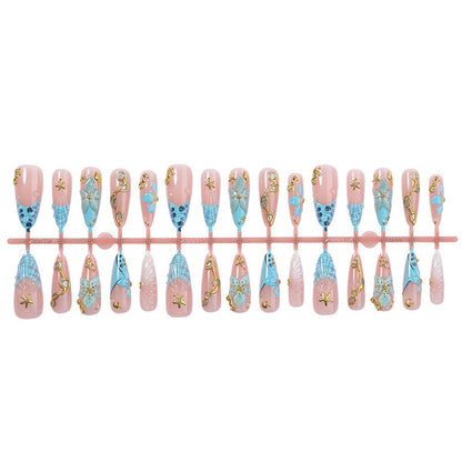 Kunstnagelset mit luxuriösen 3D-Motiven und Glitzerakzenten Brehn