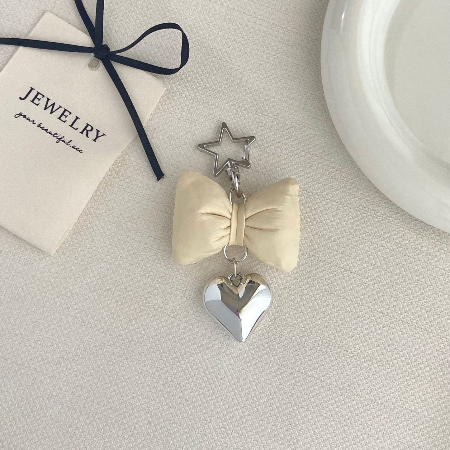 Bow-förmiger Charm Schlüsselanhänger Brehn