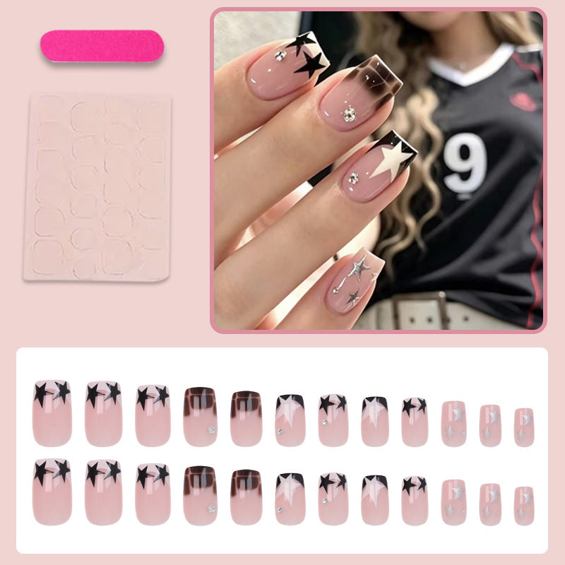 Kunstnagelset mit glamourösen Sternen- und Glitzerakzenten Brehn