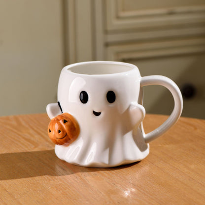 Keramik-Tasse mit 3D-Geisterform und Kürbis-Applikation