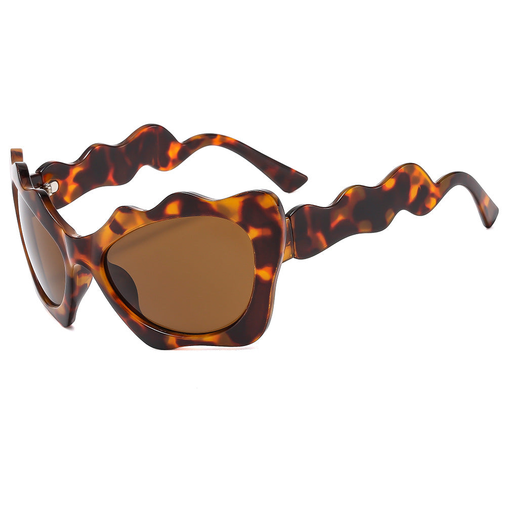 Damen Sonnenbrille im kreativen Wellen-Design Brehn