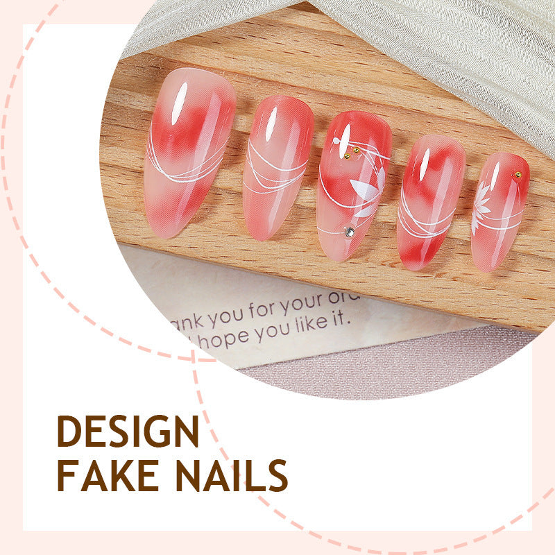 Kunstnagelset mit elegantem Ombre-Design und floralem Akzent Brehn