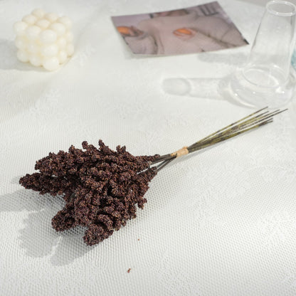 Künstlerische getrocknete Blumenstielanordnung