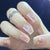 Künstlerisches Blumennageldesign Press-On Tipps Brehn