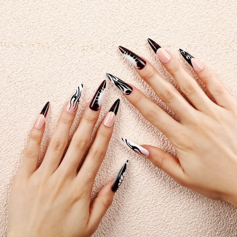 Kunstnägel mit kreativem Schwarz-Weiß-Muster Brehn