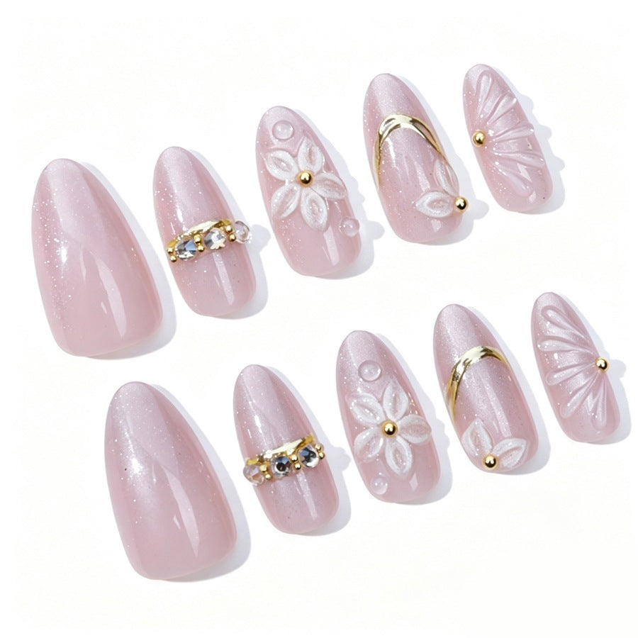 Elegantes Kunstnagelset mit Blumen- und Glitzerelementen Brehn