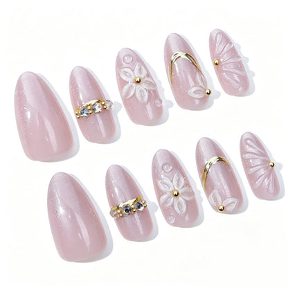 Elegantes Kunstnagelset mit Blumen- und Glitzerelementen Brehn