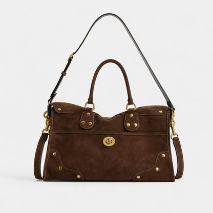 Elegante Wildlederhandtasche mit Messingakzenten
