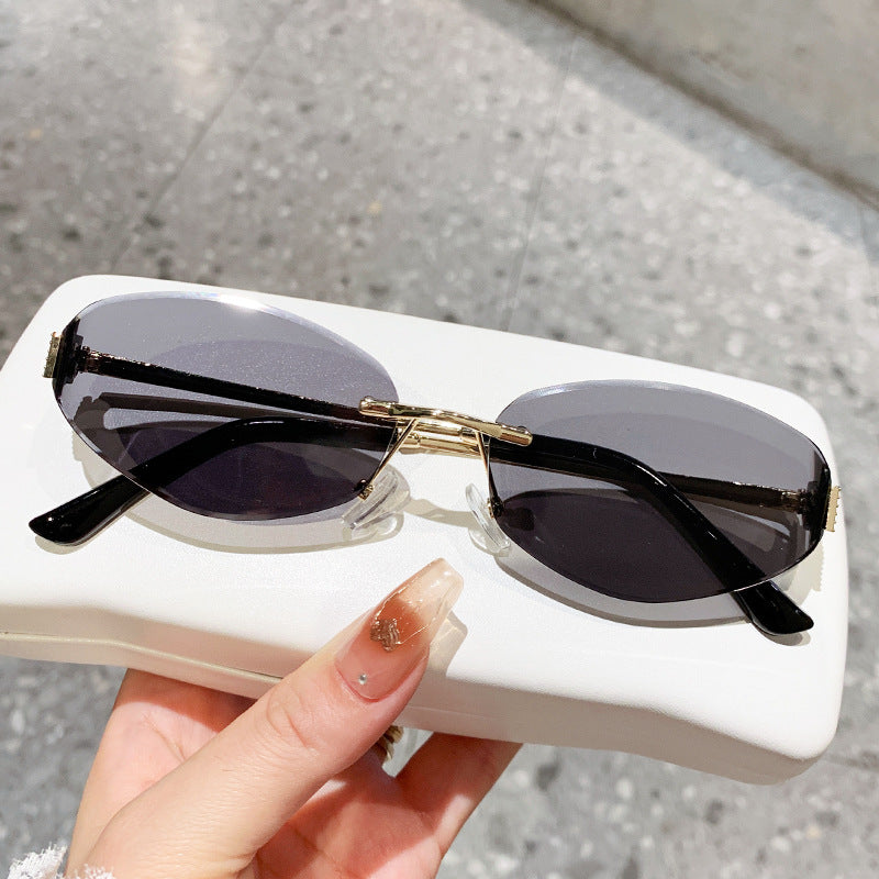 Damen Sonnenbrille im modernen Ovaldesign mit kontrastierendem Rahmen Brehn