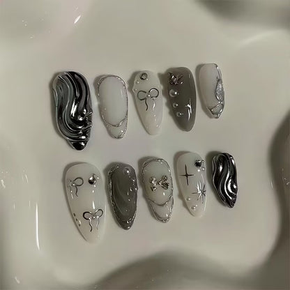 Kunstnagelset mit luxuriösen 3D-Verzierungen und eleganten Stein-Akzenten Brehn