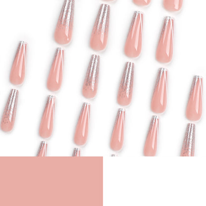 Kunstvolle Stiletto-Nägel mit Glitzer- und French-Spitze Brehn