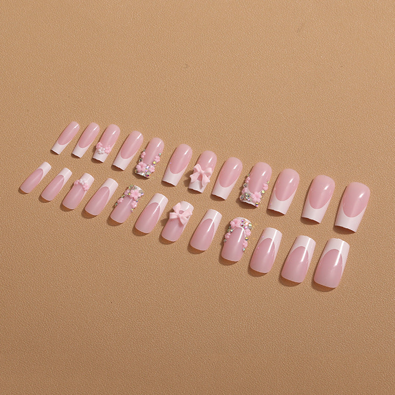 Kunstnagelset mit floralen 3D-Akzenten und Glitzerverzierungen Brehn