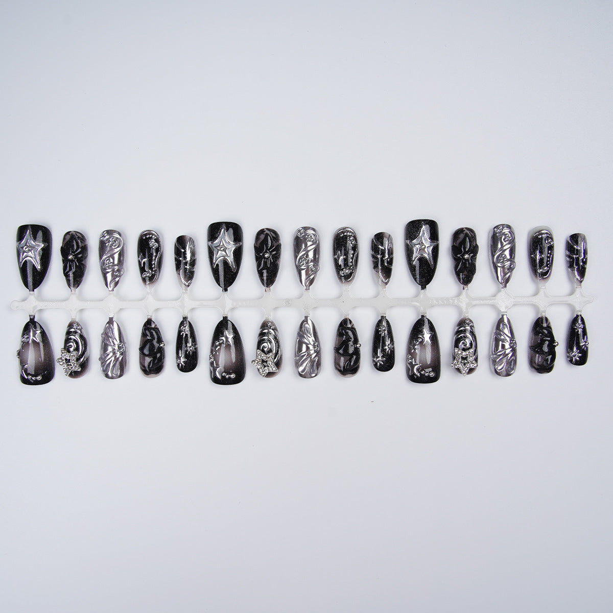 Künstlerisches schwarzes Nagelspitzen-Set Brehn