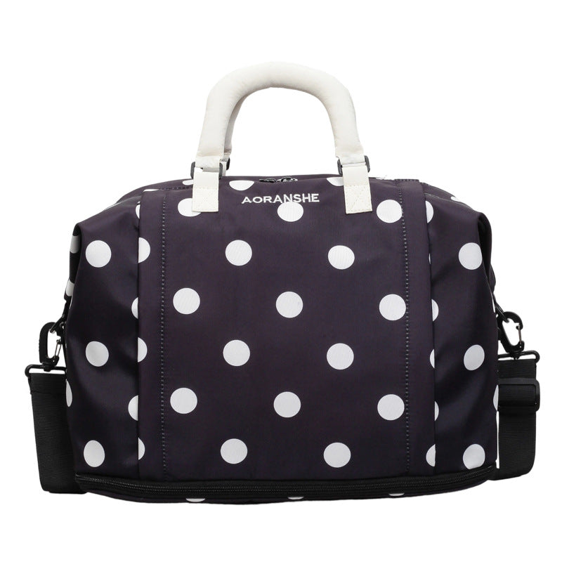 Stylische gepunktete Reisetasche