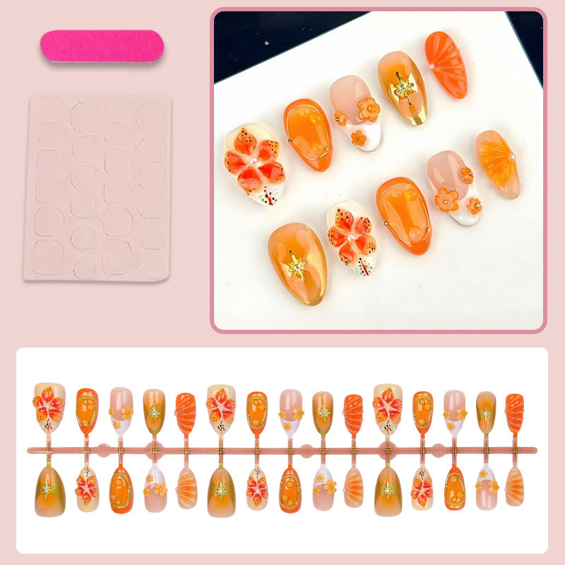 Kunstnagelset mit fröhlichen Blüten- und Glitzerdetails Brehn