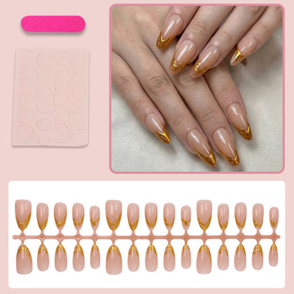 Kunstnägel mit eleganten Goldspitzen Brehn