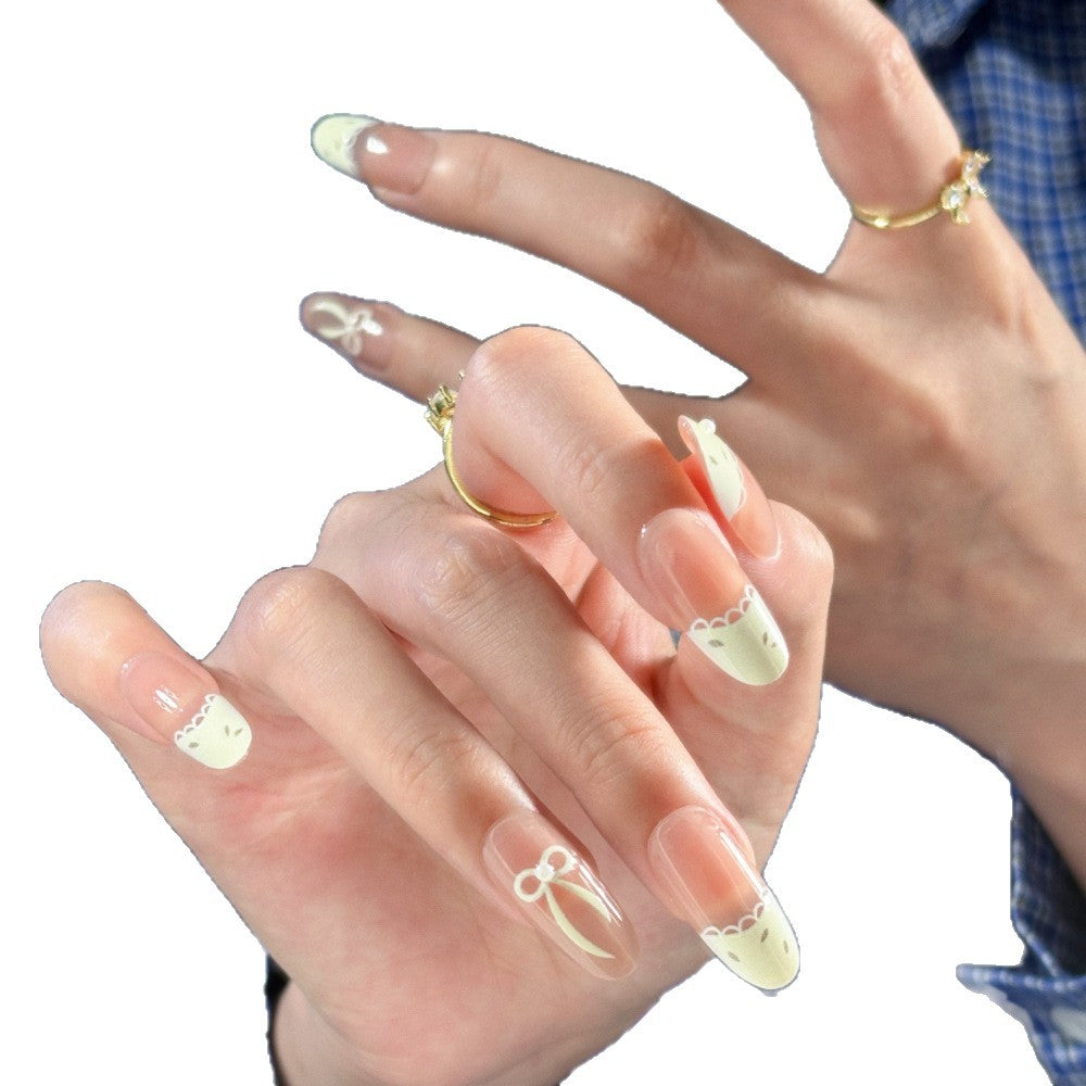Künstlerisches Press-On-Nagelset mit elegantem Schleifen-Design Brehn