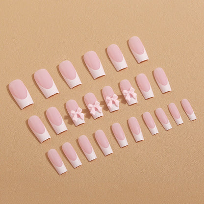 Kunstnagelset mit filigranen Schleifenverzierungen Brehn