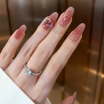 Elegante Press-On Nagelkunst mit Strassakzenten Brehn