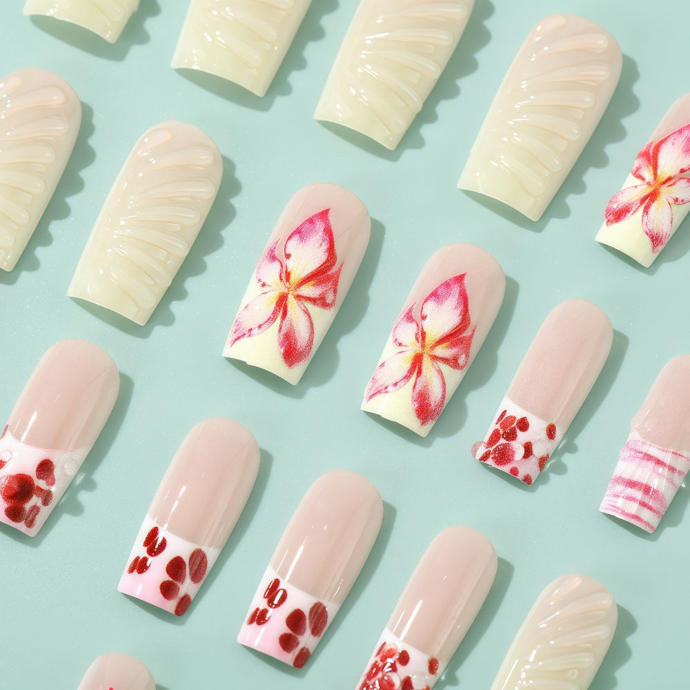 Kunstnägel Set mit eleganten floralen Designs Brehn