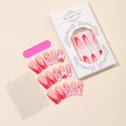 Kunstnagelset mit romantischen Kirschmotiven und eleganten Akzenten Brehn