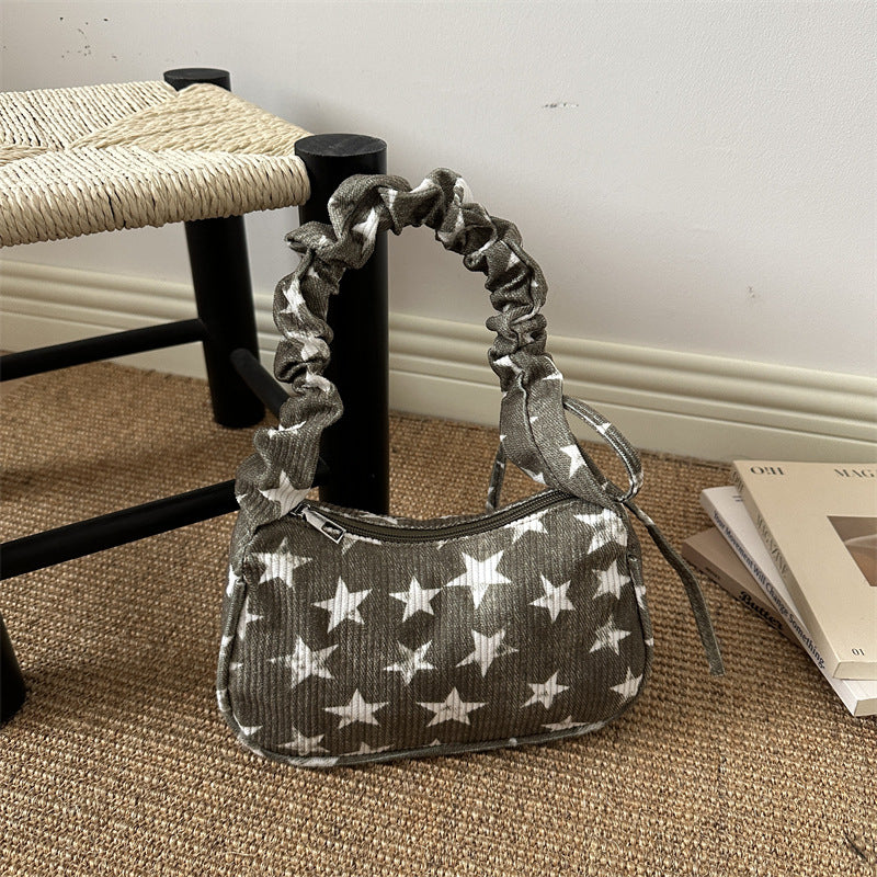 Stylishe Sternenprint-Handtasche