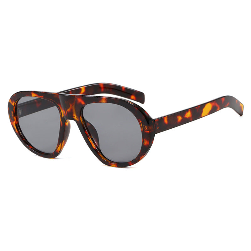 Damen auffällige Sonnenbrille mit futuristischem Rahmen und robustem Design Brehn