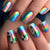Kunstnägel mit bunten Regenbogen- und Kleeblatt-Designs Brehn