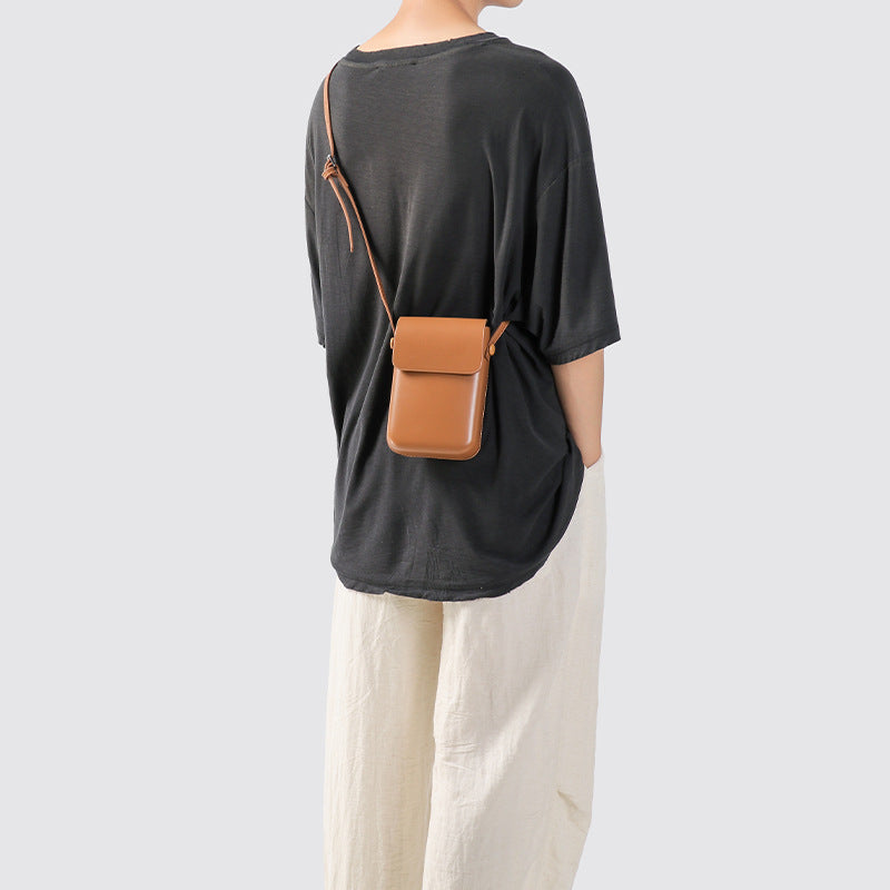 Kompakte Leder Crossbody Pouch Brehn