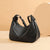 Stylische geschwungene Schultertasche Brehn