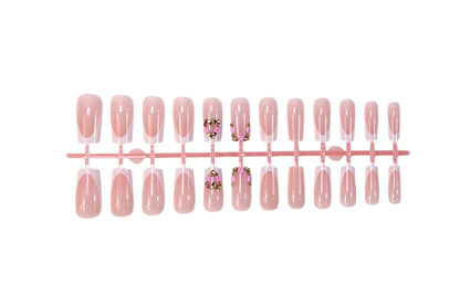 Kunstnagelset mit filigranen Blüten- und Glitzerakzenten Brehn