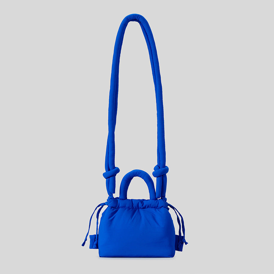 Modebewusste gepolsterte Schultertasche