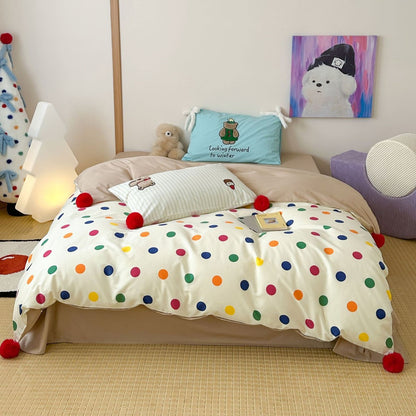 Süßes Polka-Dot-Baumwoll-Bettbezug-Set mit Cartoon-Hasen-Stickerei und roten Pompon-Tasseln
