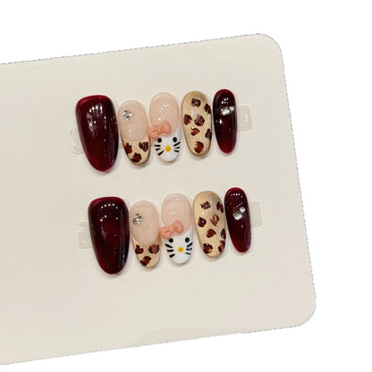 Künstlerisches Press-On Nagelkunstset mit skurrilen floralen Designs