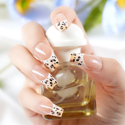 Stylische French Tip Press-On Nägel mit Tierdruck Brehn