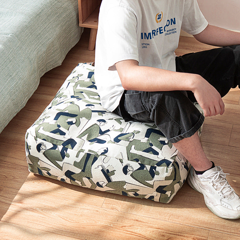 Sitzpouf aus gewebtem Baumwollmix mit gestepptem Diamant-Relief Brehn