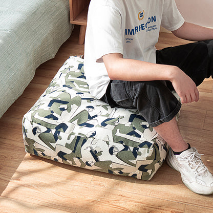 Sitzpouf aus gewebtem Baumwollmix mit gestepptem Diamant-Relief Brehn