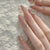 Glamorous Press-On Nail Set mit eleganten Kristallakzenten Brehn