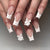 Künstliche Nagelkunst mit Schleifendekor Brehn