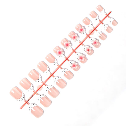 Kunstnagelset mit floralem und gepunktetem Design Brehn