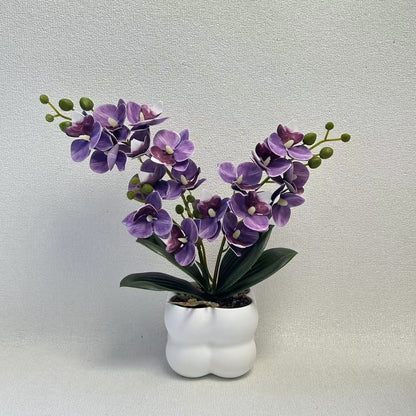 Lebensechte Orchideen Tischmittelstück