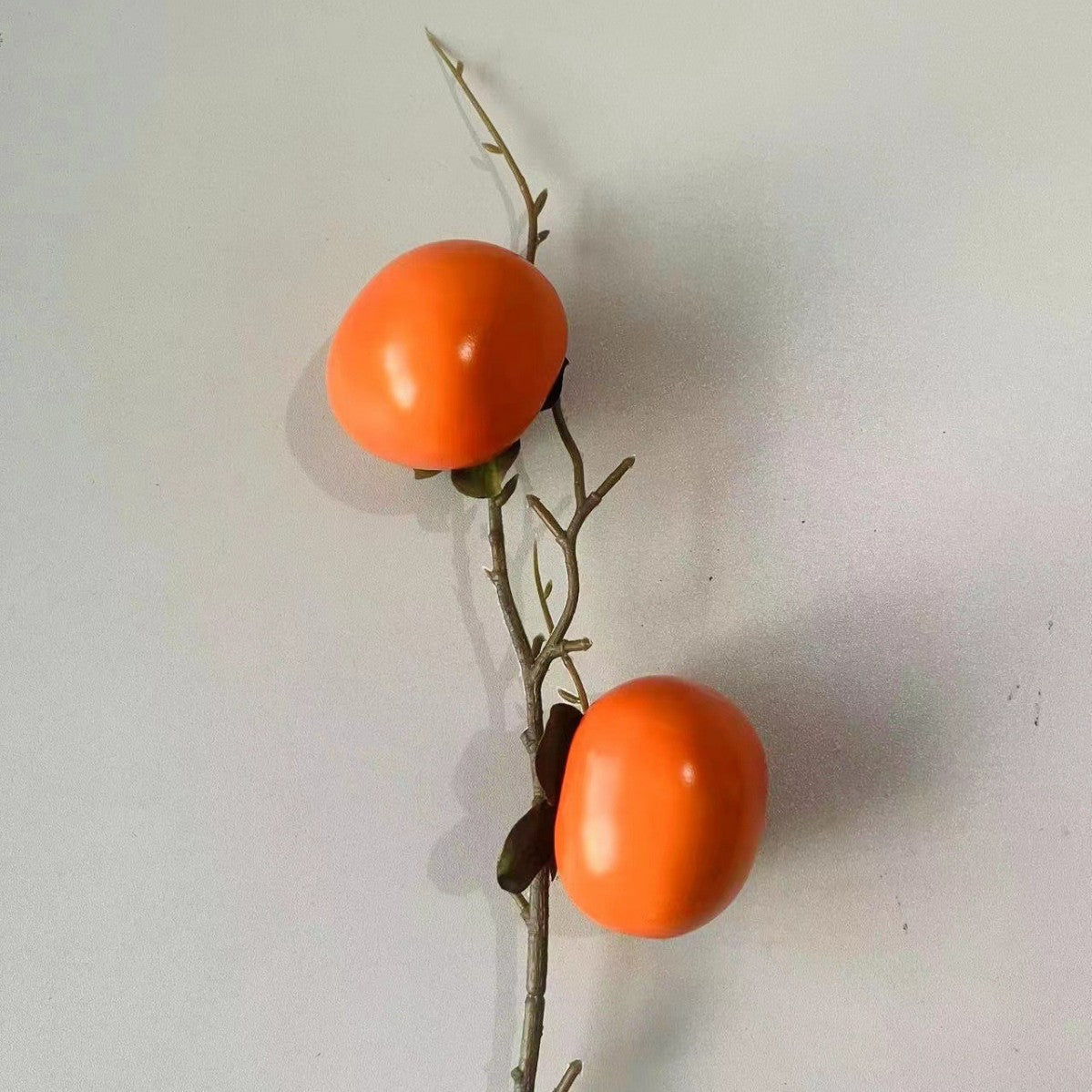 Dekoratives Goldenes Münz-Zweig Arrangement