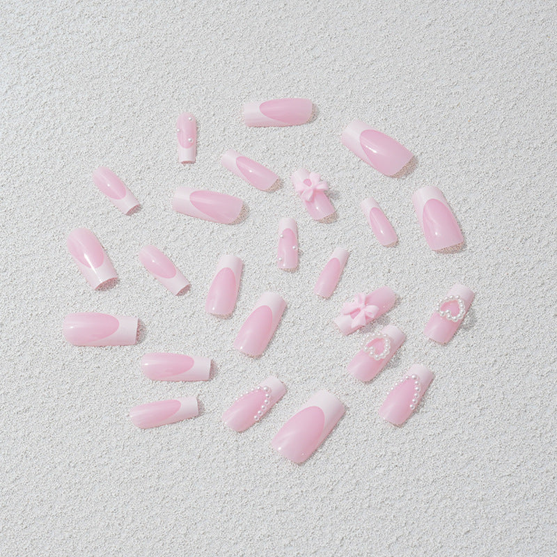 Kunstnagelset mit 3D Schleifen und Perlenakzenten Brehn