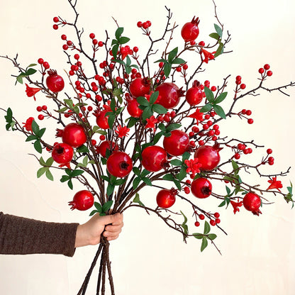 Dekorative Granatapfelblütenarrangement