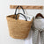 Elegante Basttasche mit Kontrastgriffen Brehn