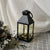 Dekorative Metall- und Glaslaterne mit warmen LED-Feenlichtern Brehn